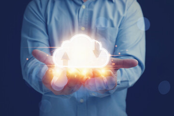 Businessman holding virtual clouds computing on hand for development system business data to the future. Technology digital internet network transformation concept.
