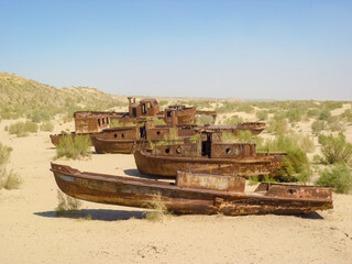 Fototapeta na wymiar Old rusty boats on the Aral Sea, Uzbekistan