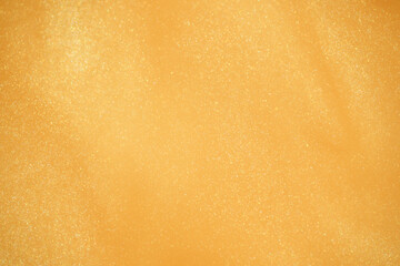 Golden glitter abstract background. Glamorous golden glittering magical bright festive background...