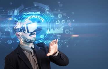 Businessman looking through VR glasses