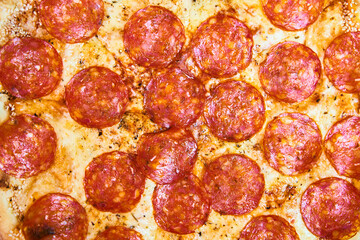 Delicious fresh pepperoni pizza in a box close up. High quality photo