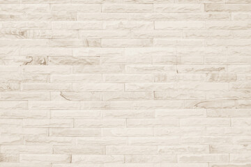 Fototapeta premium Empty background of wide cream brick wall texture. Beige old brown brick wall concrete or stone 