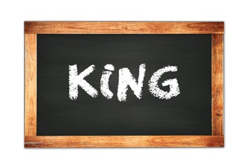 KING text written on wooden frame school blackboard.
