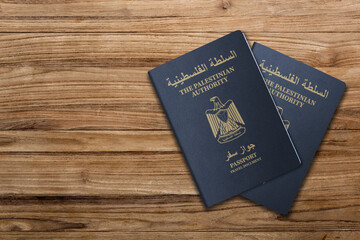 Palestine passport on wooden background, The Palestinian Authority Passport is a passport travel document 