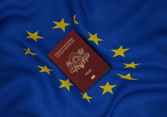 Latvia passport with European Union flag in background 