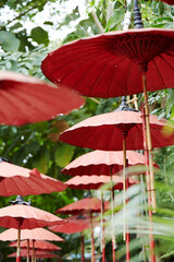 Closeup outdoor red decorative umbrella in Thailand