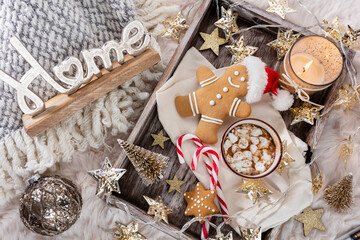 Hot chocolate with marshmallow on wool background. Christmas concept