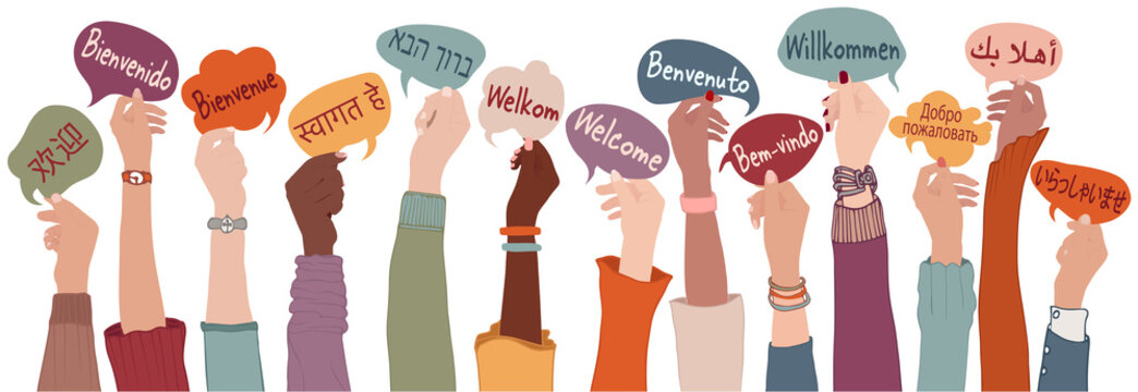 Raised arms and hands of multi-ethnic people from different nations and continents holding speech bubbles with text -Welcome- in various international languages.Communication. Community