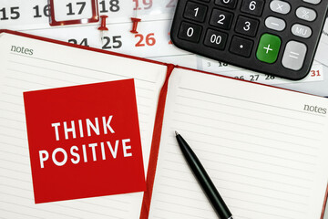 Think positive - concept of text on sticky note. Work and study concept