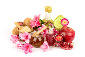Scrub with pomegranate fruits ,honey,red sugar isolated on white background.