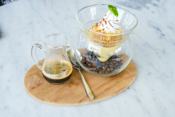 Affogato coffee with vanilla Ice Cream on table