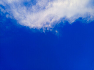 Obraz premium Blue sky texture and white clouds as background.
