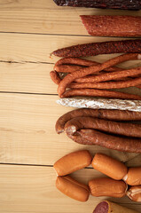 sausages on wooden board