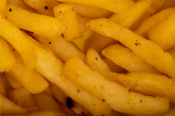 French fries on a plate, close-up, selective focus.