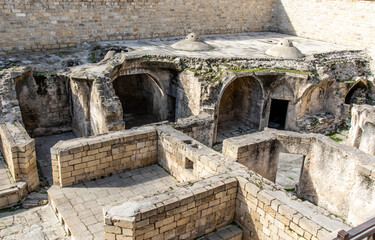 Excavations of former palace baths inside the palace of the Shirvanshahs in the old city of Baku,...