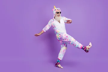Foto op Plexiglas Full length body size view of nice funny cheerful man in pajama walking having fun isolated over violet purple color background © deagreez