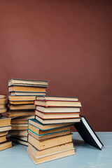 Stacks of Books for College Library Training Brown Background
