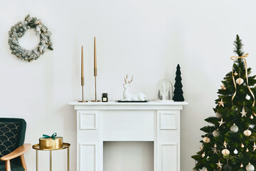 Stylish christmas living room interior with green sofa, white chimney, christmas tree and wreath, gifts and decoration. Santa claus is coming. Template.