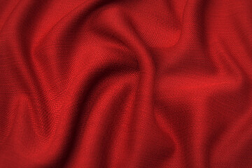 Fototapeta na wymiar Close-up texture of natural red or pink fabric or cloth in same color. Fabric texture of natural cotton, silk or wool, or linen textile material. Red and orange canvas background.
