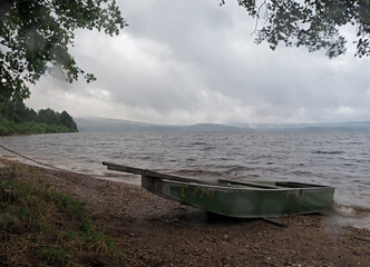 Stormy water level of lake Lipno in the mountains Sumava, Czech Republic