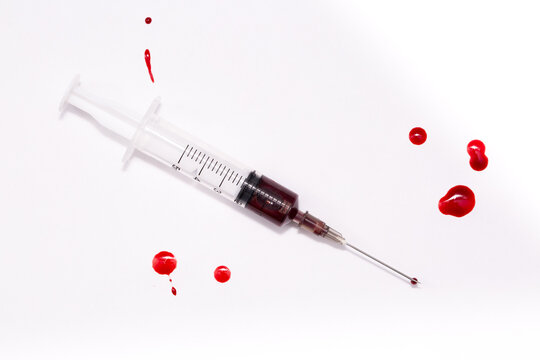 Syringe needle with drops Blood Medicine Medicine Injection Medicine concept Intravenous or Inektion with Blood Addiction, Drug Dependence