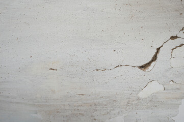 Close-up of an old cracked wall. Crack on the old wall.