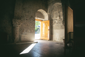 View of opened church wooden door.