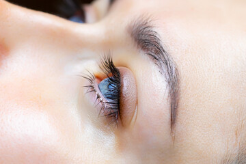 the result after performing permanent makeup of the eyelids and eyelashes - obrazy, fototapety, plakaty