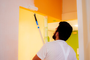 Painters refurbishing a small apartment.