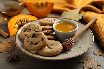 Concept of tasty food with pumpkin cookies, close up