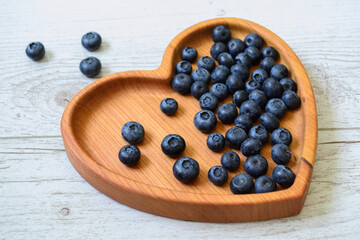 blueberries in a wooden plate