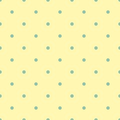 Seamless spring or summer fresh vector pattern with green polka dots on a retro vintage light yellow background