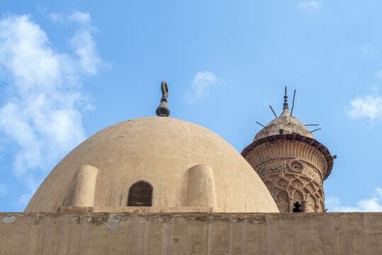 Dome at public historic mosque of Sultan Al Nassir Qalawun revealing minaret of Mamluk era El Zaher Barquq Mosque, Moez Street, Cairo, Egypt