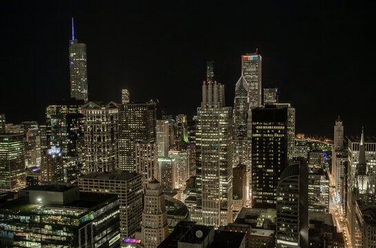 Downtown Chicago at night with lights and clear sky