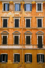 Obraz premium facade of an olg and grunge orange building