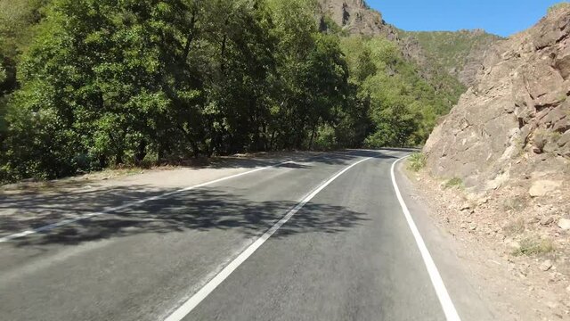 Forest asphalt road with next to Munzur River - Ovacik, Tunceli 
