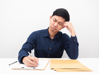 Asian man writing on document board and feeling strain white background