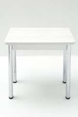 Classic wooden white kitchen table on white background.