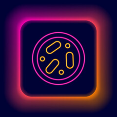 Glowing neon line Petri dish with bacteria icon isolated on black background. Colorful outline concept. Vector