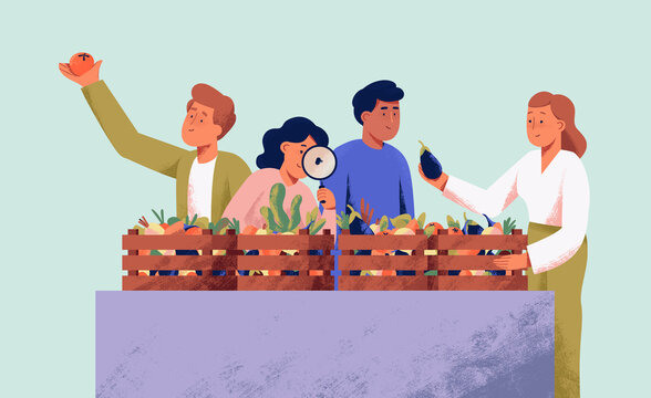 people examining vegetables