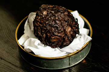 Burned cabbage in a metal plate at a restaurant