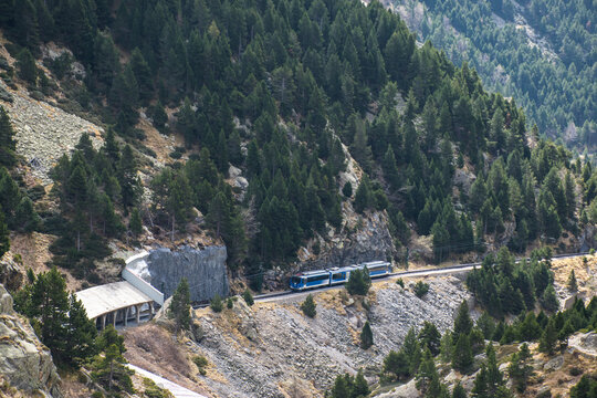Train passing through a mountain in Nuria, Catalunya