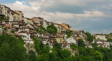 Fototapeta na wymiar View of Veliko Tarnovo, a city in north central Bulgaria. Houses built on a steep mountain.
