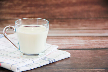 white milk drink in a glass mug