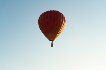 hot air balloon flying at sunset with a couple in love