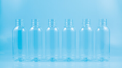 plastic bottles on a blue background,Set of plastic water bottles on a blue background