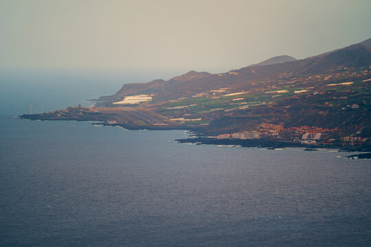 Coastal airport built between the mountains and the sea