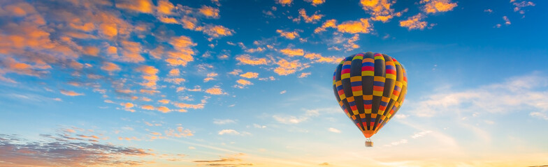 balloon and sky,Multicolored hot air balloons at sunset sky for your billboard of a travel agency...