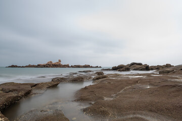 Cloudy morning, sea water, reefs and islands