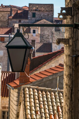 Hvar, Croatia Narrow alleys in the old town and a street lamp.